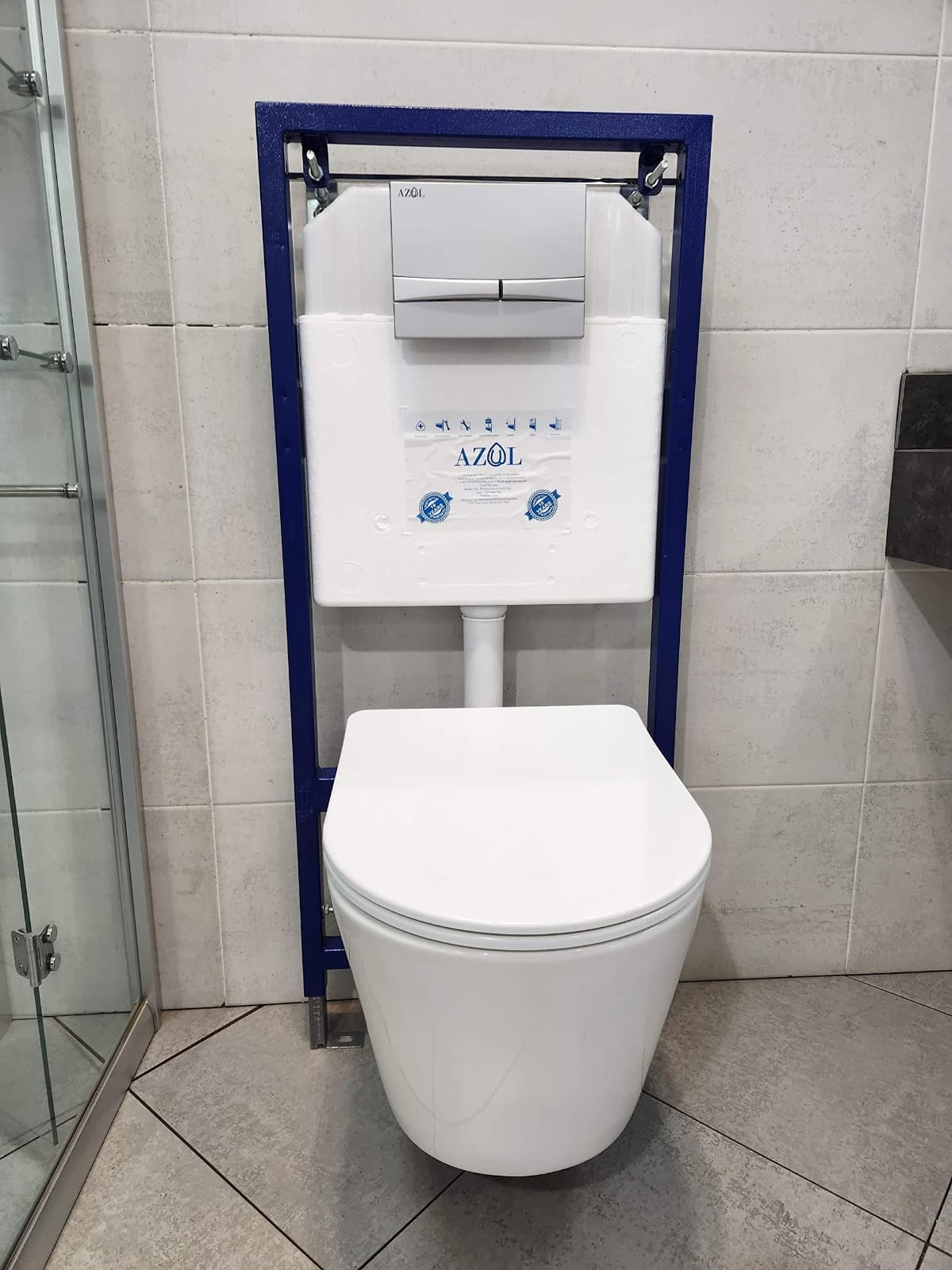 AZUL concealed cistern frame with flush plate and rimless wall-hung WC bowl